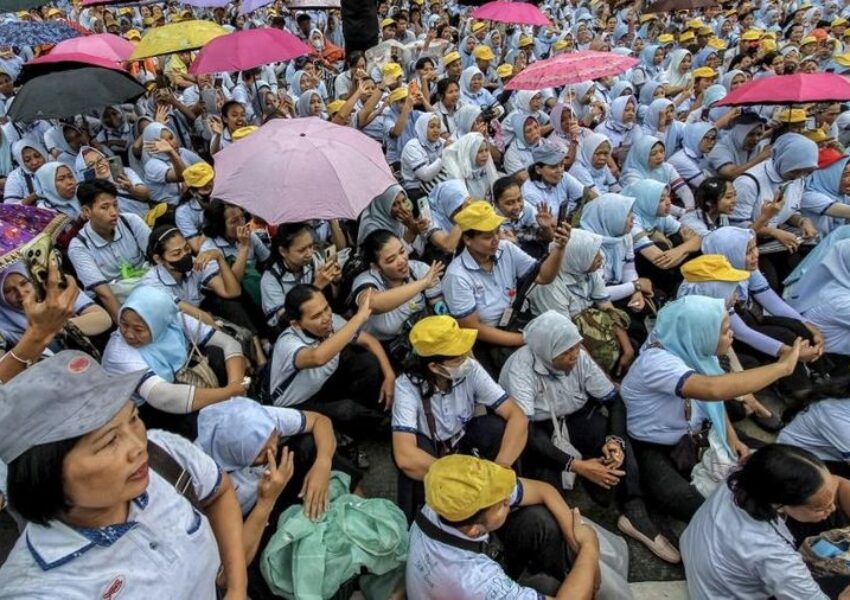 Ilustrasi Karyawan PT Sritex (Dok DIKA:AFP)